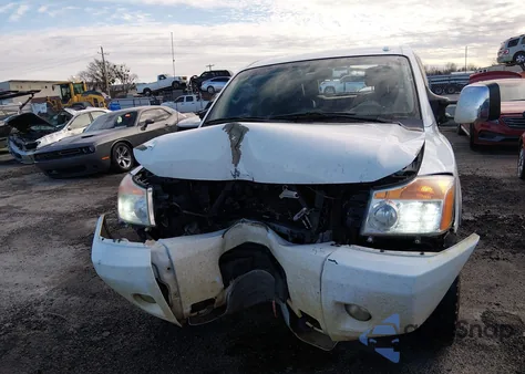 2015 Nissan Titan Pro-4X z USA, uszkodzony, nr VIN 1N6BA0EC7FN506202